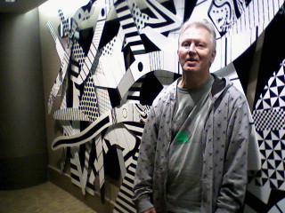 G. Parker in front of Masterpiece by Local Detroit Artist, Charlie McGee (my hometown Hero)!